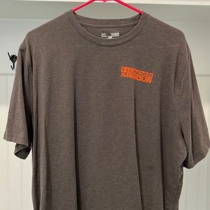 Gently worn UA tshirt. Small spot on front